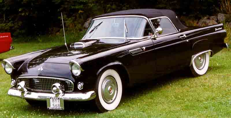 A black 1955 Ford Thunderbird