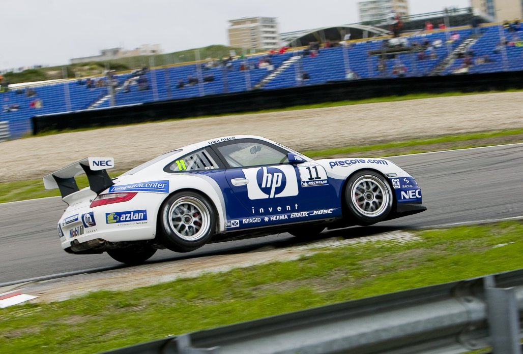 Uwe Alzen driving in a Porsche Carrera Cup Germany 997 cup car in 2006