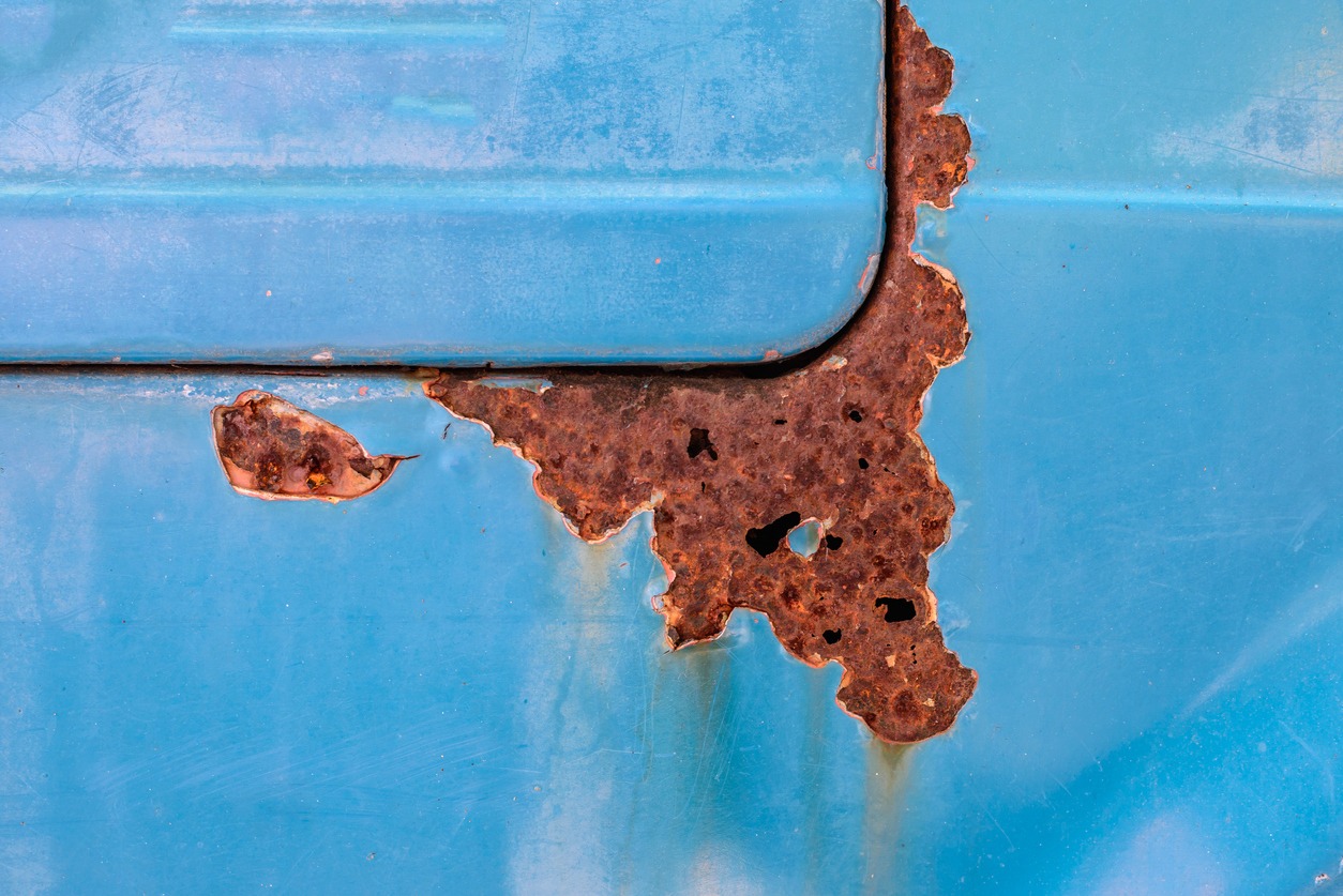 Rusty and color scratched of old car.