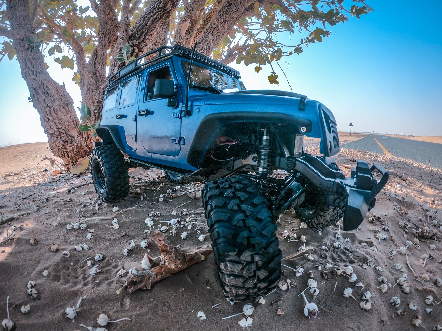 An off-road jeep’s suspension system.