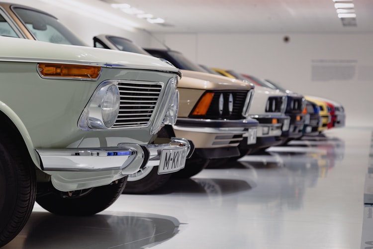 Rows of BMW cars in a car museum.
