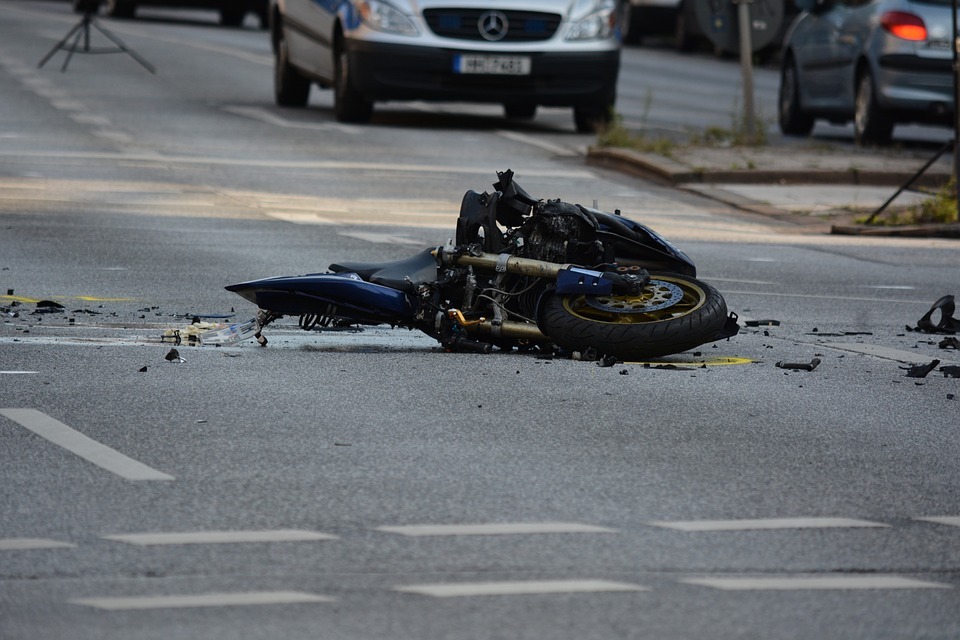 I've been in a motorcycle accident, what should I do at the scene