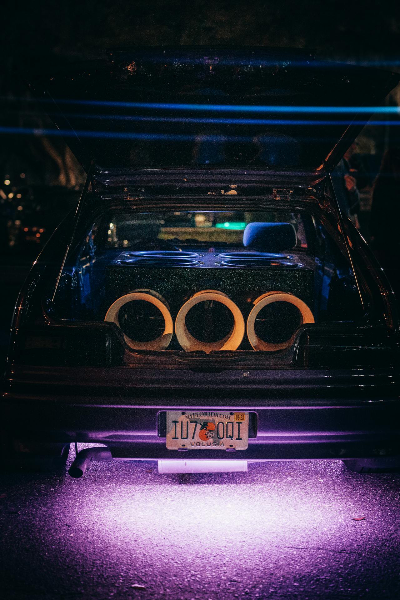 https://www.pexels.com/photo/large-speakers-in-the-car-trunk-and-an-led-light-under-the-car-15646676/