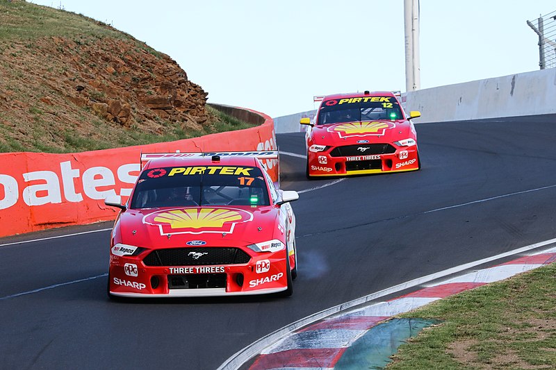 Scott McLaughlin and Alexandre Prémat (foreground) won the 2019 Bathurst 1000 while teammates Fabian Coulthard and Tony D'Alberto (background) were relegated to last place after a rules breach.