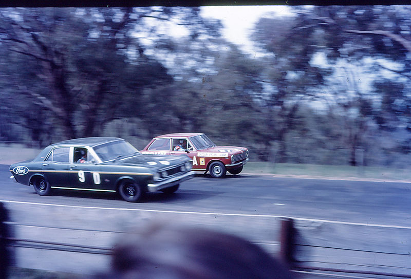 The Ford XT Falcon GT of Barry Seton and Fred Gibson overtakes the Datsun 1000 of Bill Evans and John Colwell during the 1968 race.