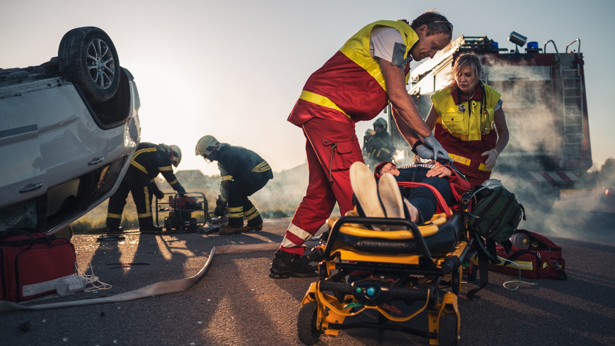 On the Car Crash Traffic Accident Scene: Paramedics Saving Life