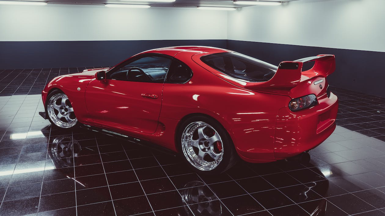 Red-shiny-car-inside-a-garage