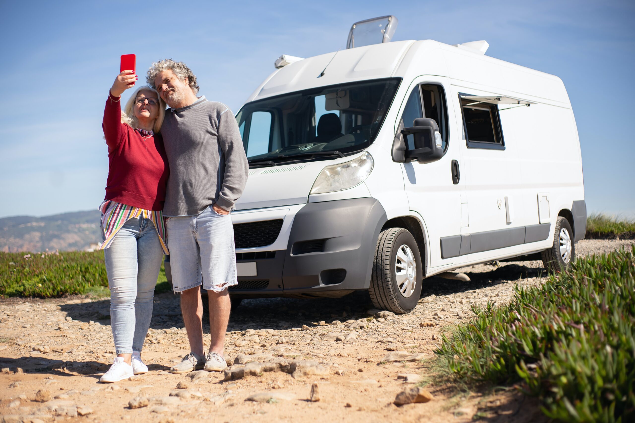 an-elderly couple-with-their-RV