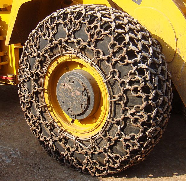 Traction chains on a wheel loader