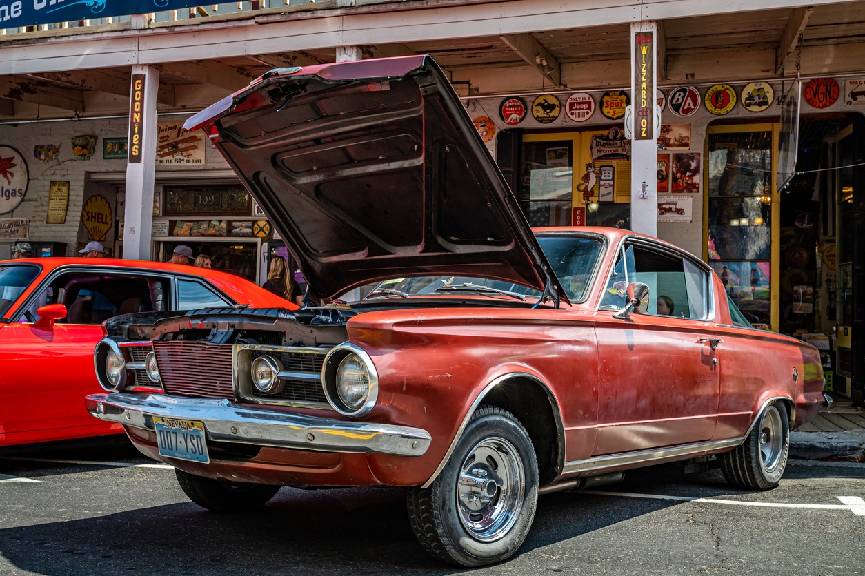 1965 Plymouth Barracuda parked outside