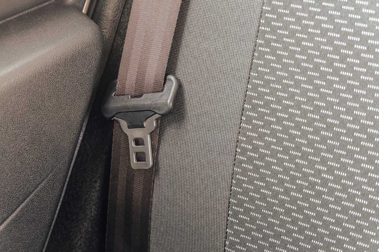 a fabric car seat with seatbelt