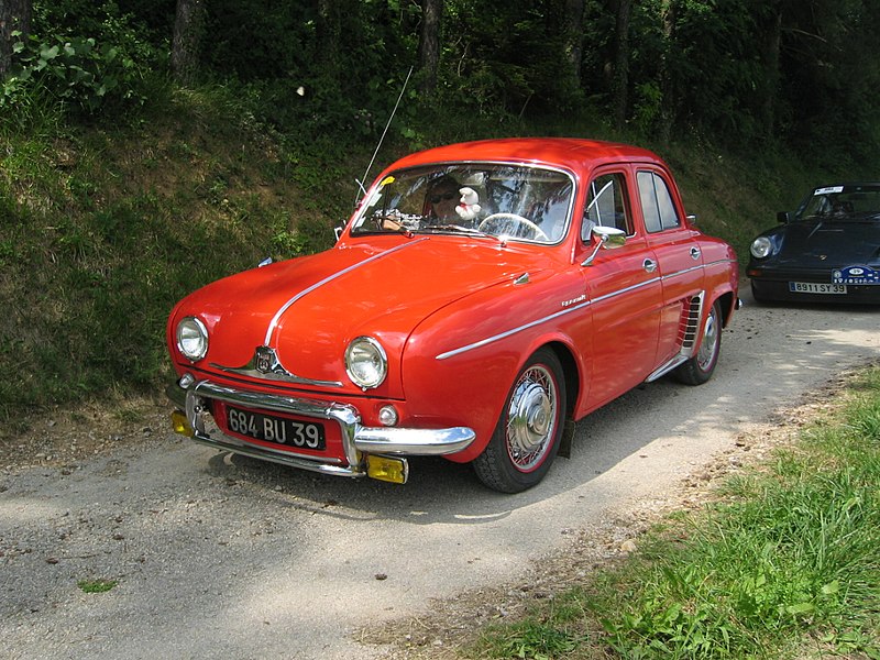 a red Renault Dauphine