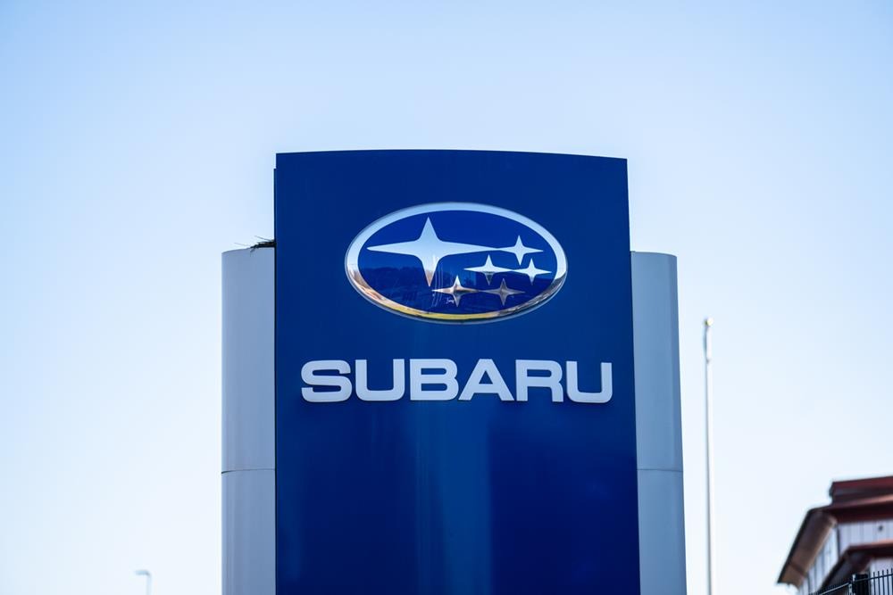 A Subaru sign at a car dealership